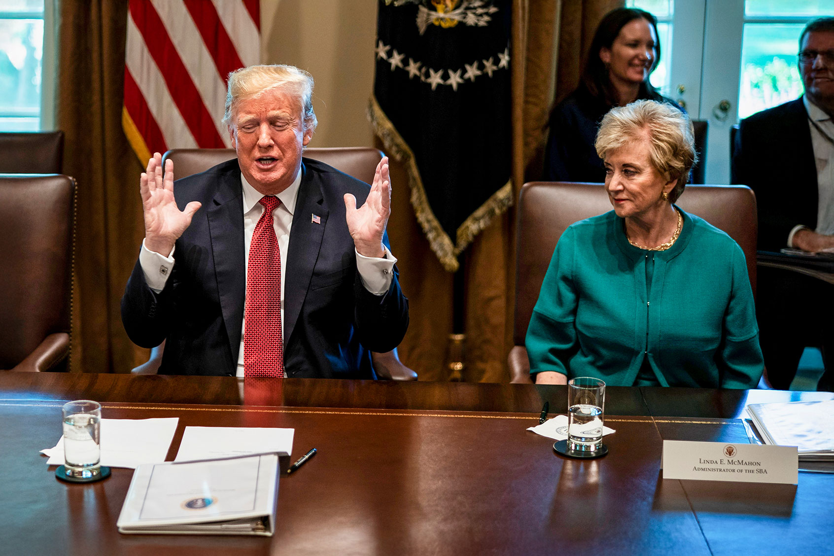 President Donald J. Trump speaks while Small Business Administration Linda McMahon listens on during a cabinet meeting in the Cabinet Room of the White House on Wednesday, Oct. 17, 2018 in Washington, DC. (Jabin Botsford/The Washington Post via Getty Images)